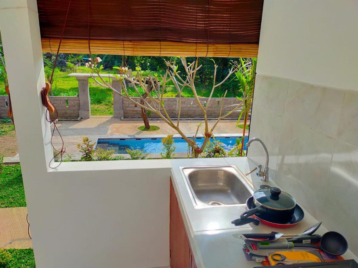 Okaoki Homestay Amed Esterno foto