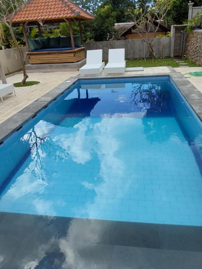 Okaoki Homestay Amed Esterno foto