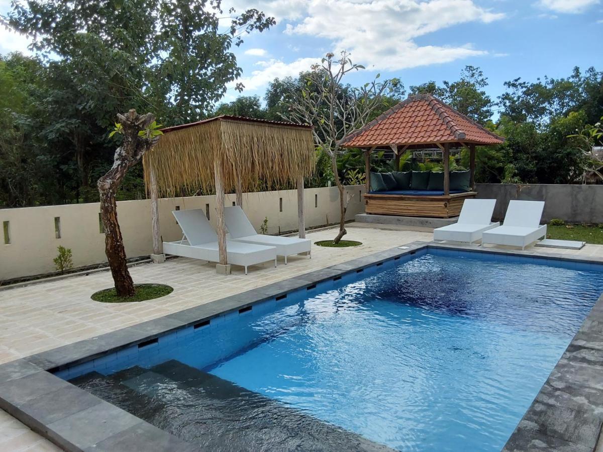Okaoki Homestay Amed Esterno foto